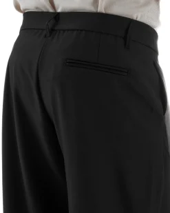 Pantaloni uomo viscosa baggy abbottonatura asimmetrica nero GIOSAL-P6465A